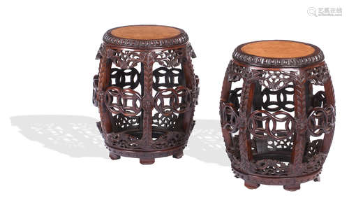 Mid-Qing Dynasty A pair of huanghuali and burlwood drum-shaped stools