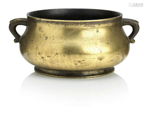 Xuande six-character mark but 18th century A gilt bronze incense burner