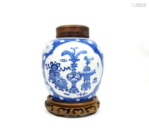 19th century A blue and white jar with wooden cover and stand