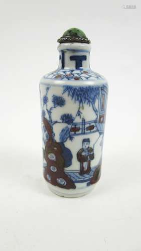 Yongzheng six-character mark  A blue and white and copper-red over glaze snuff bottle