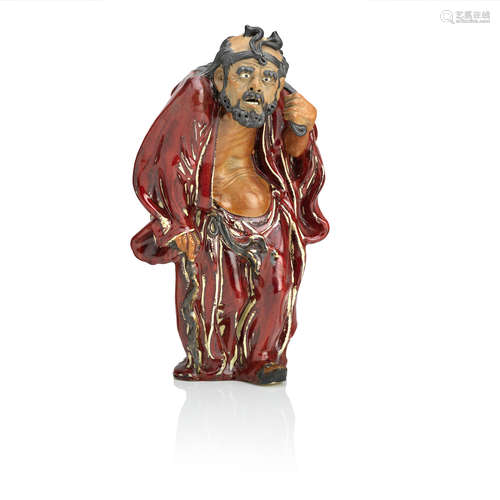 20th century A Shiwan pottery figure of an Immortal