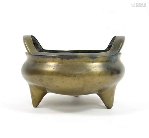 Xuande six-character mark but later A bronze tripod incense burner