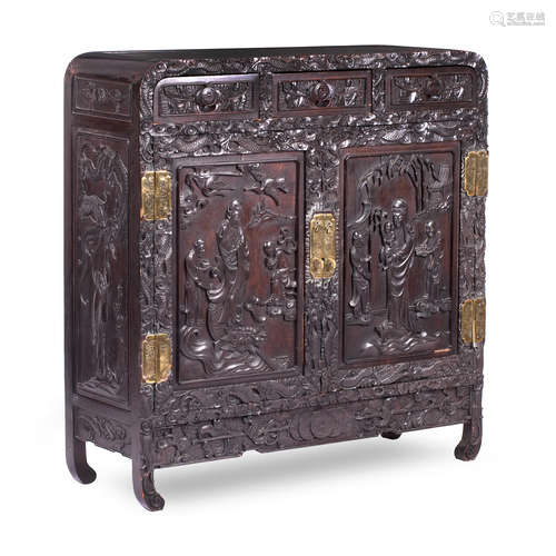 Late 19th century A carved hardwood side cabinet