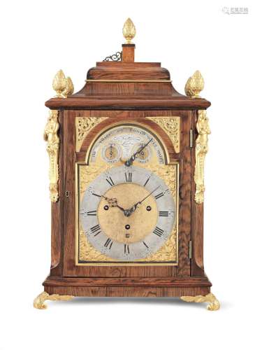 An 18th century musical table clock playing one of six tunes on 13 bells and 23 hammers The later dial signed for Norton, London