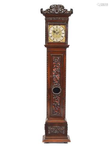 A fine and rare late 17th century carved walnut Dutch-striking longcase clock with alarm and calendar Fromanteel