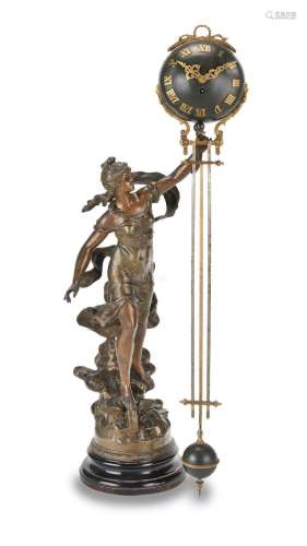 A late 19th/early 20th century French patinated spelter figural novelty timepiece The base signed Louis Moreau