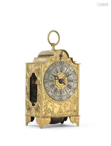 A rare mid 18th century German engraved brass travel clock with alarm