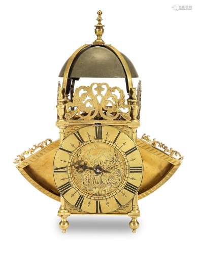 A brass winged lantern clock  Roger Moore, Ipswich