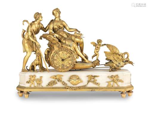 An early 19th century French ormolu-mounted white marble mantel timepiece  The base with an applied pair of ormolu love-struck hearts engraved with the initials VS and AD