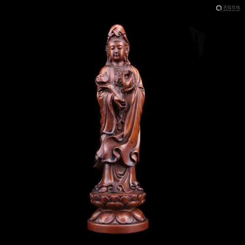 A HUANGYANG WOOD CARVED GUANYIN STATUE