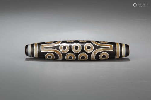 A SILVER INLAID TIBET DZI BEAD