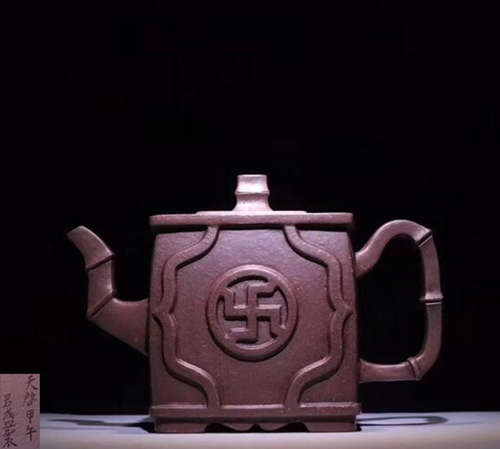 A BAMBOO SHAPED HANDLE TEAPOT WITH MARK