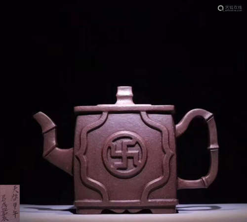 A BAMBOO SHAPED HANDLE TEAPOT WITH MARK