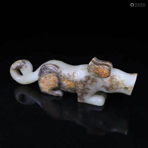 A HETIAN JADE CARVED TIGER SHAPED PENDANT