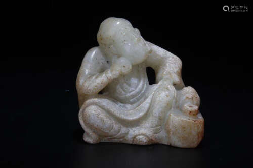 A HETIAN JADE CARVED LUOHAN FIGURE STATUE