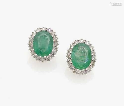 A PAIR OF EMERALD AND DIAMOND SET EAR-CLIPS Italy