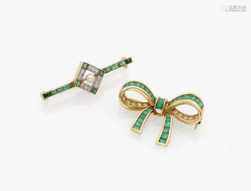 TWO BROOCHES, ONE OF RHOMBOID FORM THE OTHER BOW FORM, SET WITH EMERALDS AND DIAMONDS Germany, 1920s and 1950s