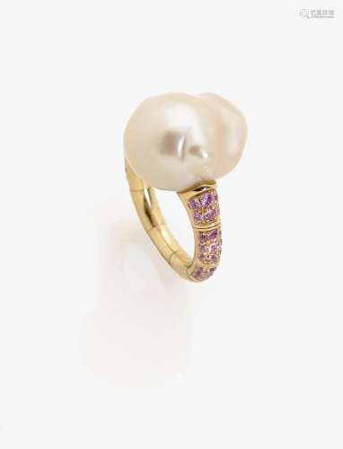 A BAROQUE CULTURED PEARL AND PINK SAPPHIRE SET RING Japan, MIKIMOTO