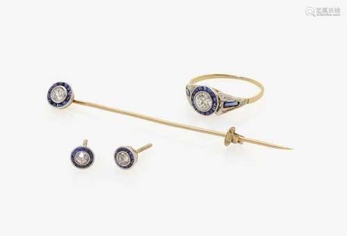 A BAR BROOCH, A RING AND A PAIR OF EARRINGS WITH DIAMONDS AND SAPPHIRES France, circa 1910-1915