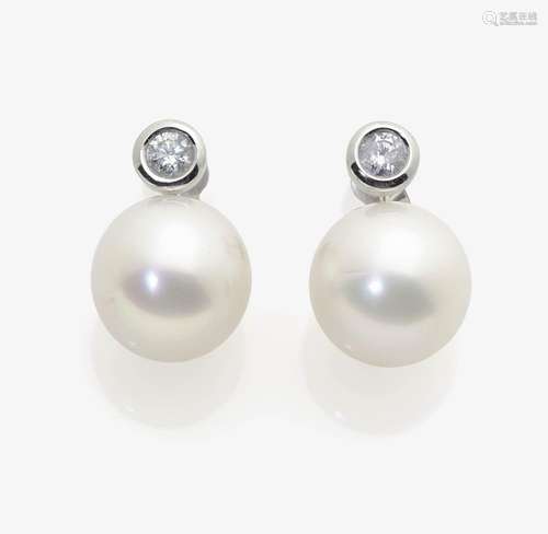 A PAIR OF SOUTH SEA CULTURED PEARL AND DIAMOND EAR STUDS