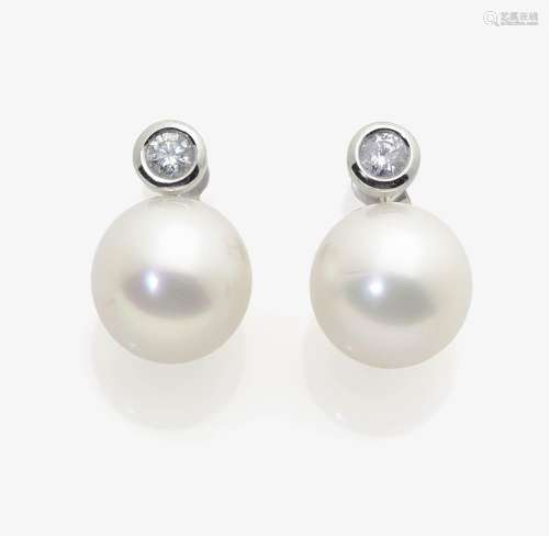 A PAIR OF SOUTH SEA CULTURED PEARL AND DIAMOND EAR STUDS