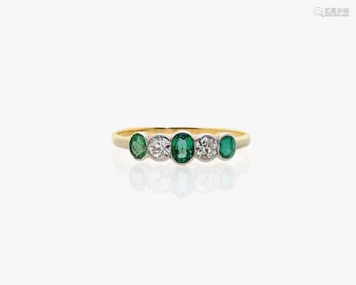 A HISTORICAL EMERALD AND DIAMOND SET RING Germany, Art Déco, circa 1925