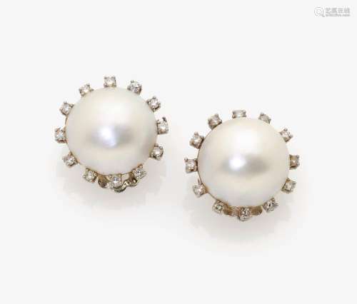 A PAIR OF EAR-CLIPS WITH MABÉ CULTURED PEARLS AND DIAMONDS Germany, 1970s