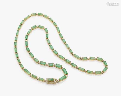 A DIAMOND AND EMERALD SET NECKLACE