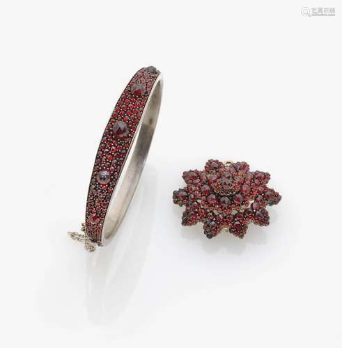 A GARNET SET PENDANT AND BANGLE Bohemia, circa 1870-1880