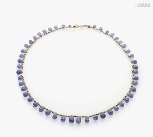 A TANZANITE AND GOLD BEAD NECKLACE Germany, 1980s-1990s