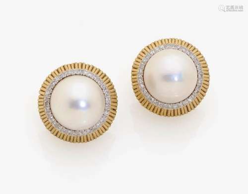 A PAIR OF MABÉ CULTURED PEARL AND DIAMOND SET EARRINGS USA, 1950s-1960s