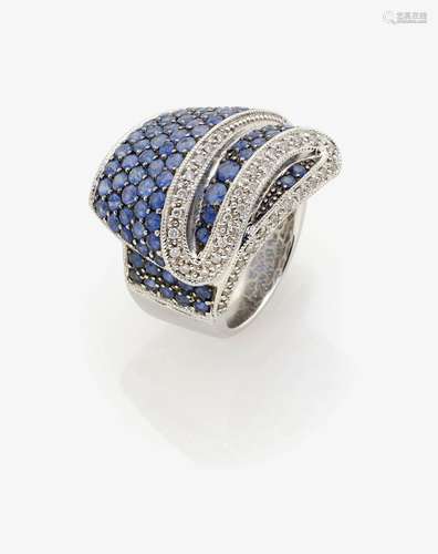 A DIAMOND AND SAPPHIRE RING