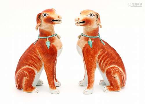 PAIR OF SEATED DOGS