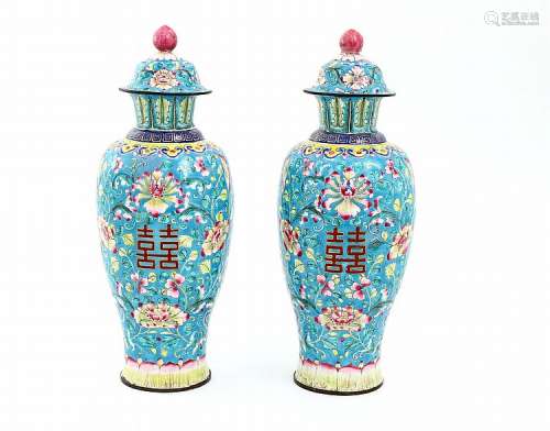 PAIR OF POTS WITH COVERS