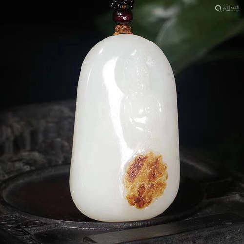 A GUANYIN PATTERN HETIAN JADE PENDANT