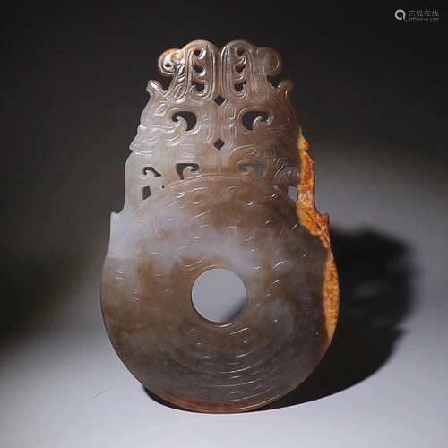 A SHANG DYNASTY JADE BI, 17th-11th CENTURY BC