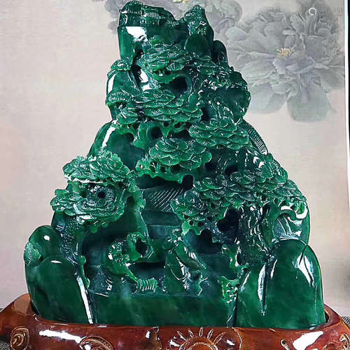 A HETIAN GREEN JADE ORNAMENT