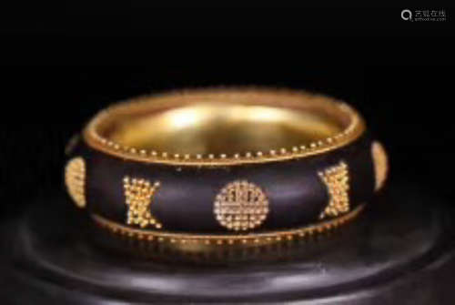 A QING DYNASTY STYAL EAGLEWOOD GILT SILVER BRACELET