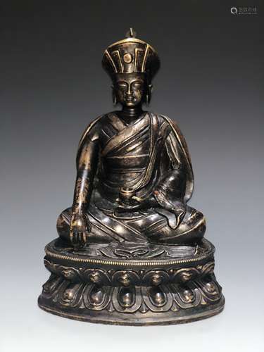 A Rare Silver-Inlaid Copper Alloy Figure of Guru