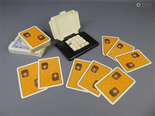 An 'Austen of England' Bakelite Puzzle Game together with a pack of Waddington's Playing Cards.                                                                                                                                                        Antiques