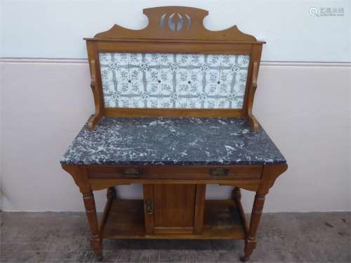 An Art Nouveau Satin Wood Marble-Top Washstand with central drawer