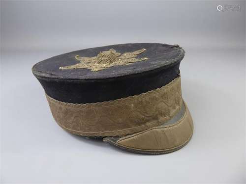 A Late 19th Century Field Officer's Kepi with silver braid and top button