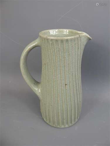 A Leach School Elegantly Crafted Celadon Green Glazed Pitcher