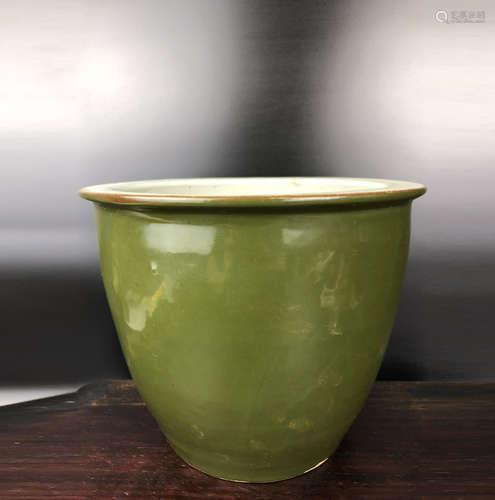 A GREEN GLAZE EVERTED RIM JAR