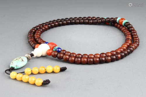 A BEADS STRING BUDDHIST NECKLACE