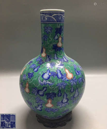 A GREEN-GROUND GOURD PATTERN TIANQIU VASE