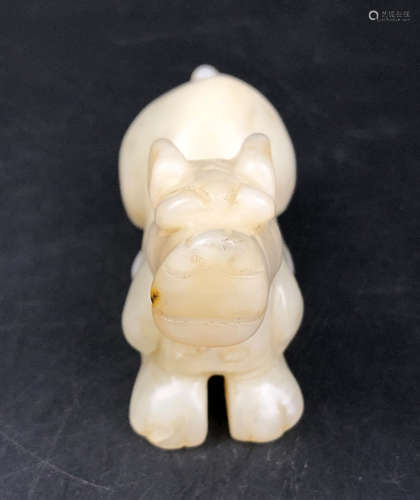 A HETIAN JADE BEAST SHAPED PENDANT