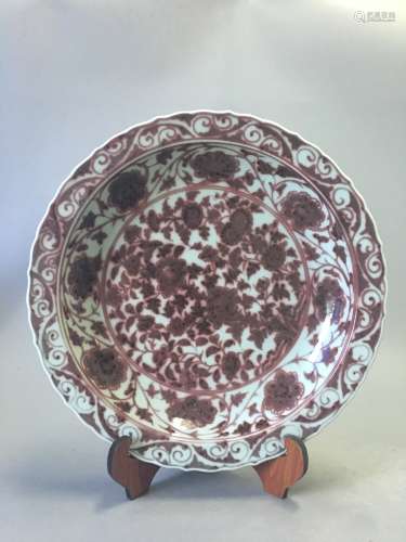 A UNDERGLAZE RED FLORAL PATTERN CHARGER