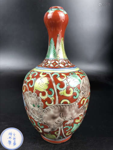 A SANCAI FLORAL AND LION PATTERN VASE