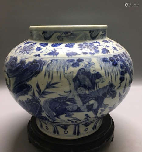 A BLUE AND WHITE FIGURE PATTERN JAR